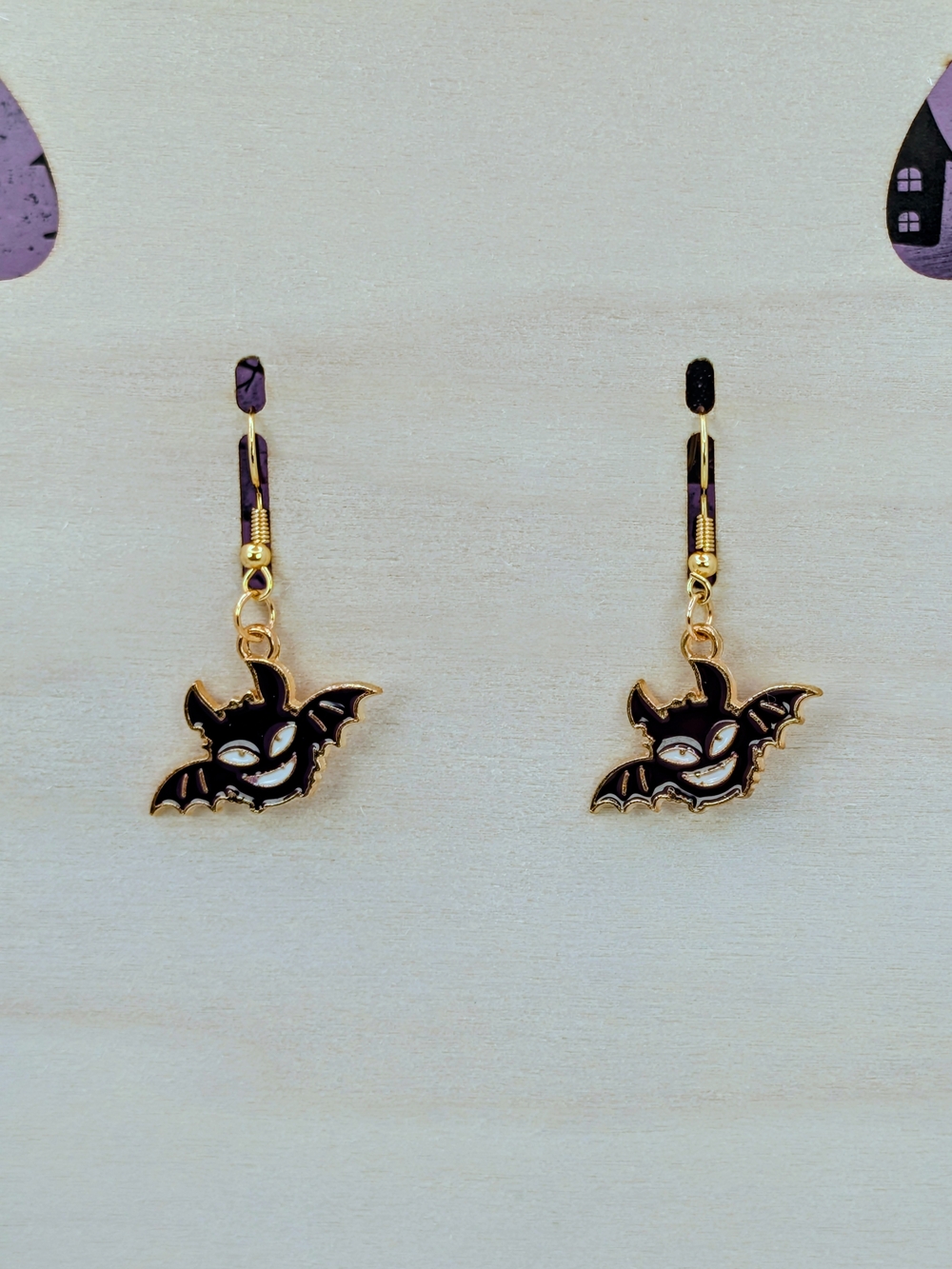 Black Enamel Bat Dangle Earrings With Gold Tone Hardware
